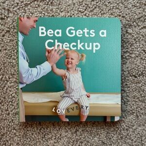 Lovevery Bea gets a checkup book